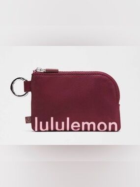 lululemon athletica burgundy coin pouch with pink logo